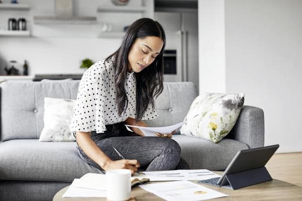 Professional Organizer working in a living room